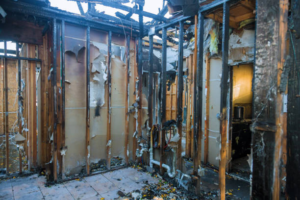 Professional Fire Damage Restoration technician working in Ortonville, MI